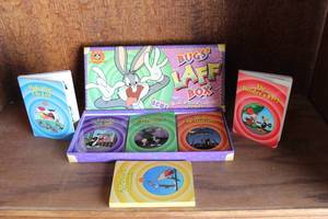 lot 38 image: Looney Tunes Bugs Laff Box collectible book set