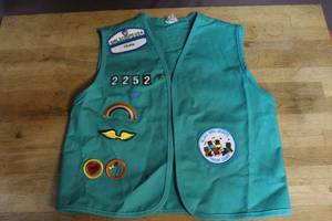 lot 47 image: Girls scout vest with patches on the front and back see pictures for details