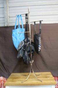 lot 56 image: Small display rack and bags