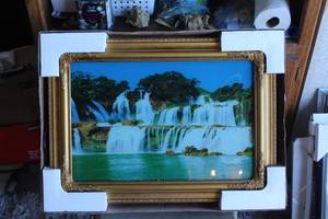 lot 90 image: vintage-style electric motion wall hanging featuring a scenic picture
