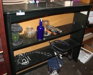 lot 294 image: Green shelf and all contents on dark green shelf