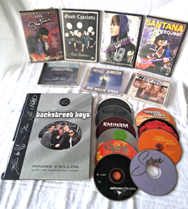 lot 204 image: Assorted music CDs, DVDs and a Backstreet Boys book