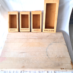 lot 167 image: Maple wood butcher bock and bamboo wood storage boxes