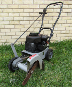 lot 34 image: Craftsman 3.5 hp edger (engine cranks but doesnt start)
