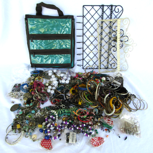 lot 4 image: Huge selection of assorted fashion jewelry and jewelry storage racks