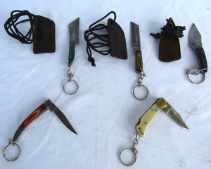 lot 16 image: NEW genuine Damascus steel blade pocket and mini lanyard knives with leather sheaths (Bid is times the quantity)