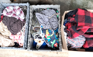 lot 190 image: Two storage totes and one box full of clothes