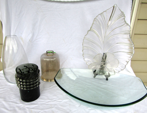 lot 42 image: Large heavy glass serving bowl, large leaf shape serving platter and more as shown