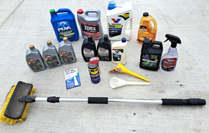 lot 22 image: Automotive supplies, Peak & Zerex anti-freesecoolant, STP motor oil, wash brush & chemicals plus