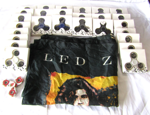 lot 68 image: Led Zeppelin wall banner, 28 fidget spinners NIB