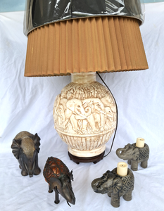 lot 101 image: Elephant lamp and small heard of elephants