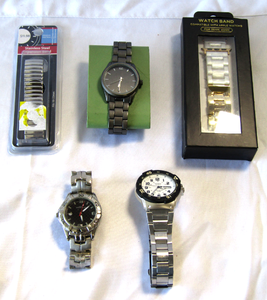 lot 89 image: Casio and other mens watches plus custom watch band for Apple watch and a stainless steel expansion band both NIB