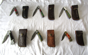 lot 148 image: NEW genuine Damascus steel blade folding pocket knives with leather sheaths (Bid is times the quantity)