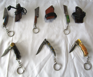 lot 133 image: NEW genuine Damascus steel blade pocket and mini lanyard knives with leather sheaths (Bid is times the quantity)