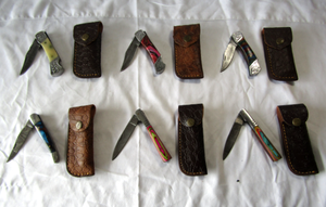 lot 134 image: NEW genuine Damascus steel blade folding pocket knives with leather sheaths (Bid is times the quantity)