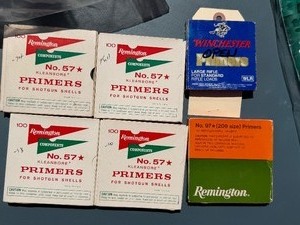 lot 142 image: Remington primer #57, Remington primer 7, and Winchester LR primer