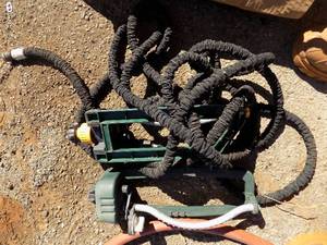 lot 96 image: 2 sprinklers and  1 water hose