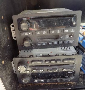 lot 139 image: 2 car radios one with cassette and one with cd player