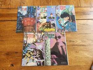 lot 67 image: Vintage lot of 5 - DC Comics - Doom Patrol - vintage selection #49, & 51-54