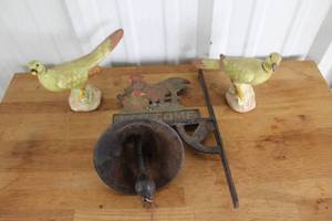 lot 21 image: vintage cast iron rooster welcome sign with a bell.and decorative bird figurines one has a small chip see pictures