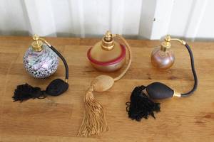 lot 22 image: collection of vintage-style glass perfume bottles