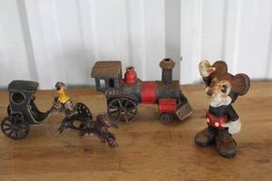 lot 28 image: collection of vintage cast-iron toys and bank