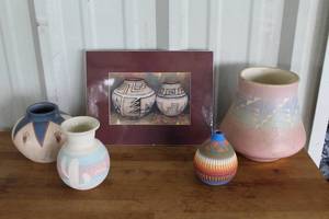 lot 62 image: collectible Southwestern-style Native American pottery vases, featuring handcrafted geometric and traditional designs