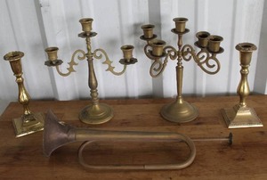lot 65 image: vintage brass candelabras and candle holders vintage brass bugle is a collectible item featuring a natural patina and a simple one-twist design