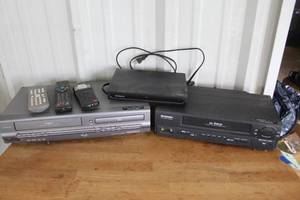 lot 88 image: Magnavox MWD2205 DVDVCR combo player and vintage Sylvania VHS VCR player and more see pictures