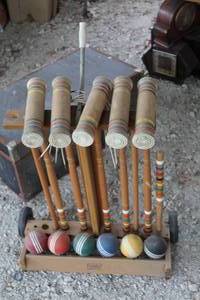 lot 96 image: vintage wooden croquet set  features a sturdy wheeled cart for storage and transport