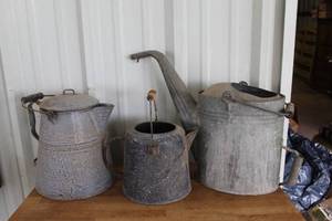 lot 97 image: collectible vintage items, specifically antique galvanized watering cans and pitchers