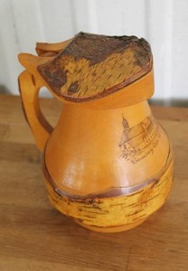 lot 105 image: vintage German hand-carved birch wood beer stein