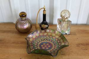 lot 145 image: vintage Fenton Amethyst Carnival Glass bowl features an iridescent finish and a coin dot pattern  vintage perfume bottles