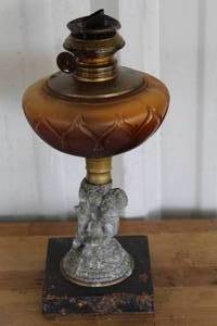 lot 158 image: antique figural cast metal oil stand lamp