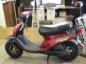 1999 red Yamaha Zuma scooter. vin#vg54uyaoxxa104566 kick started it and it started right up but was out of gas so it died fast and is going to need a new battery also has title