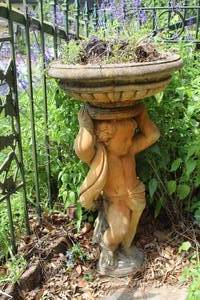 lot 470 image: vintage cast stone bird bath featuring a cherub pedestal