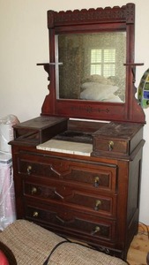 lot 526 image: Eastlake walnut dresser featuring a marble top and a swivel mirror