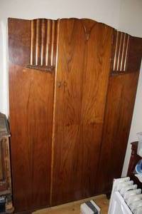 lot 529 image: Art Deco wardrobe armoire with a wooden finish (contents not included)