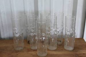 lot 544 image: vintage 1960s Libbey La Femme highball glasses featuring a raised 3D design of nude figures