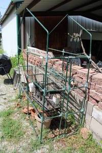 lot 553 image: greenhouse frame. And gardening pots