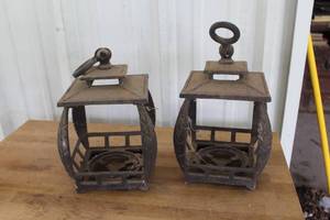 lot 555 image: vintage-style cast iron candle lanterns