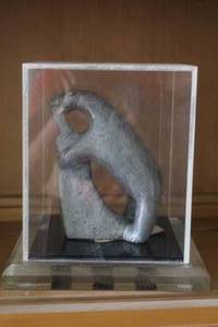 lot 628 image: gray stone sculpture soda in one picture to show size
