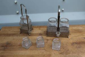 lot 640 image: vintage pickle casters, often featuring clear glass jars in ornate silver-plated metal caddies, popularized in Victorian-era dining