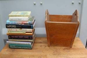 lot 652 image: Collection of books see pictures for titles with a wood book holder