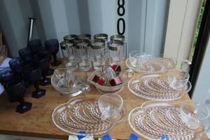 lot 660 image: Fostoria Moonstone wine goblets in a dark or cobalt blue color. And vintage Federal Glass Hospitality snack sets and much more see pictures for details