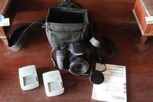 lot 692 image: Canon PowerShot digital camera bundle,