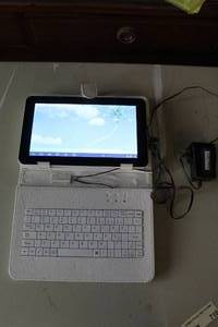 lot 710 image: Android tablet with a matching keyboard folio case