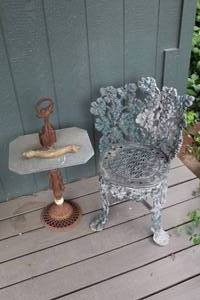 lot 730 image: vintage metal smoking stand table and vintage cast metal Victorian-style garden chair