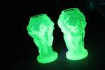 vintage Desna Vaseline uranium glass vase featuring sculpted figures in a "Harvesting Venuses"