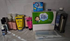 lot 180 image: Bathroom Items and More Tissues, hand lotion, hair gel, hand soap and foaming dispenser and more